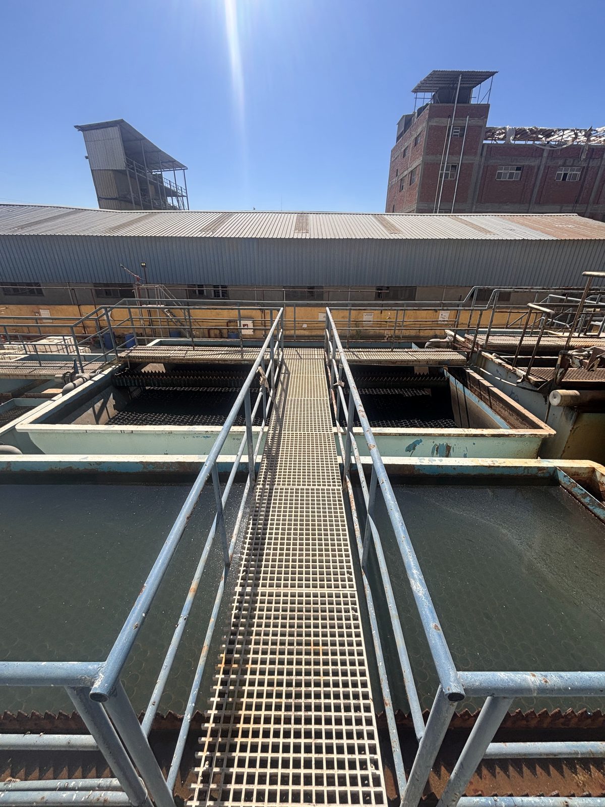 Water treatment basins and access walkway